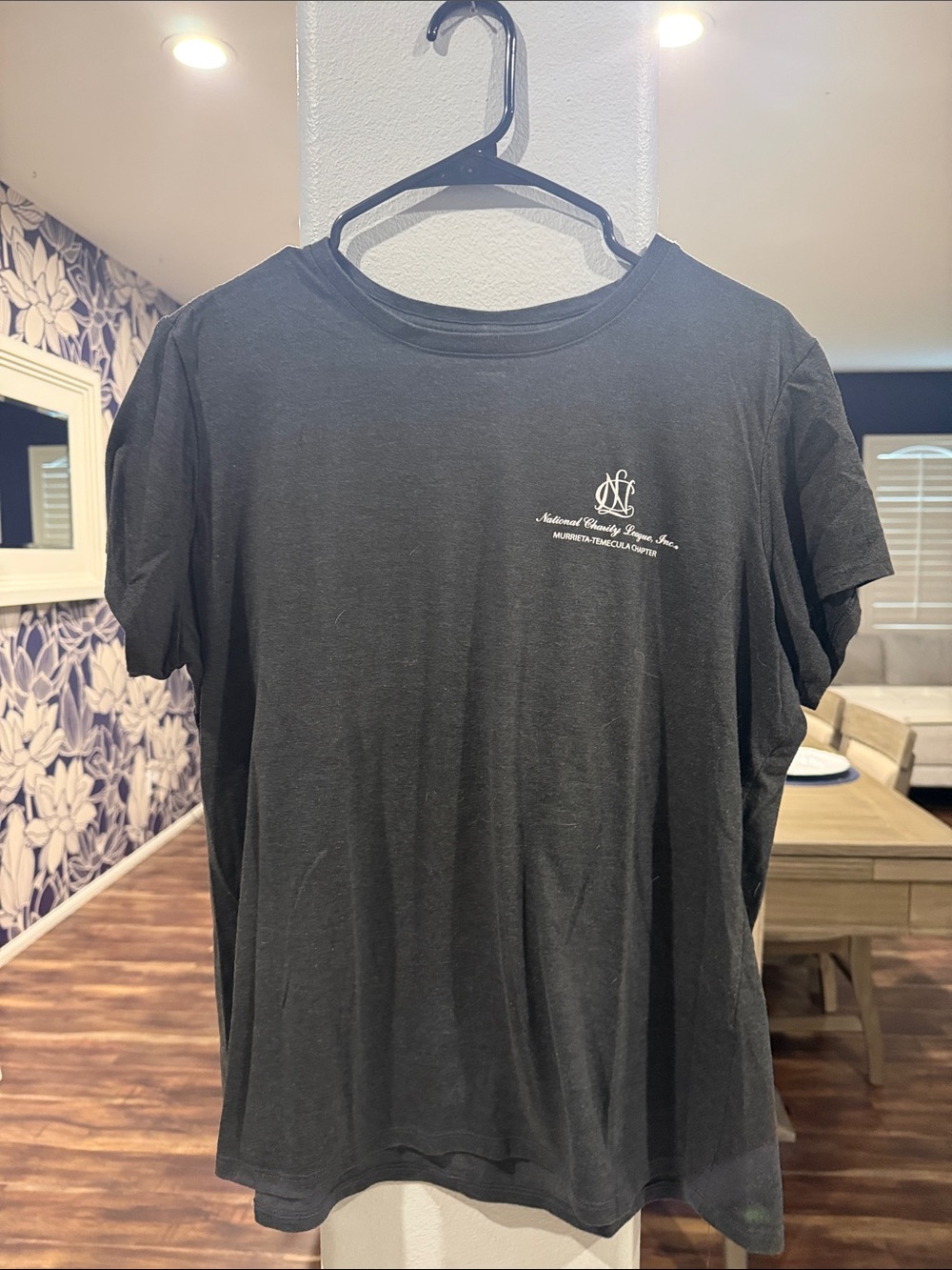 District Black Short Sleeve Crew Tee with Small White Script NCL Logo